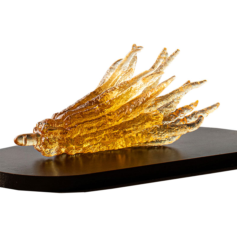 حامل بخور زجاجي ذهبي اللون على شكل يد